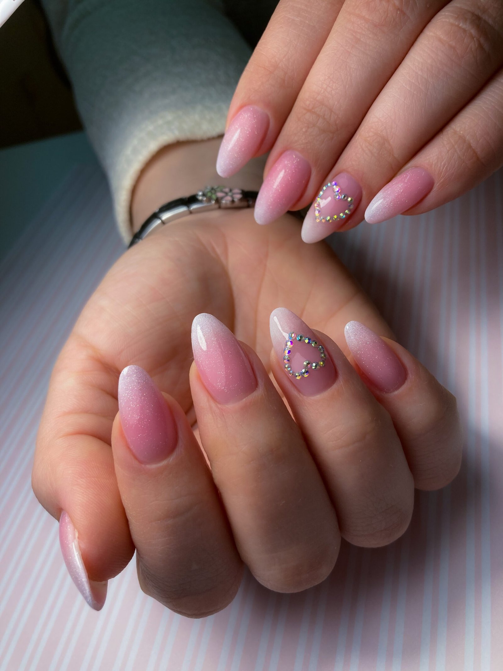 Stylish fashionable female manicure. Hands of a beautiful young woman and modern design.
